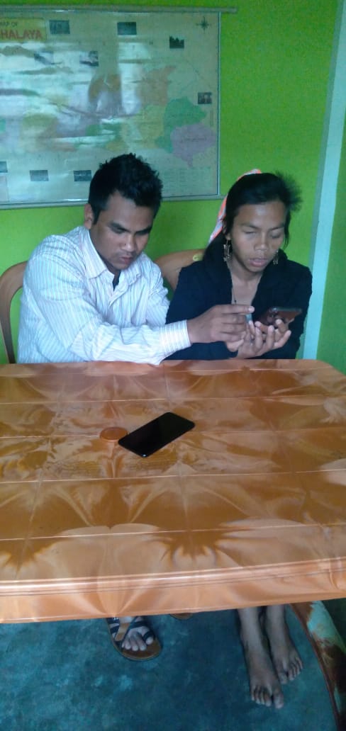 Photo: blind people using a mobile phone -2
