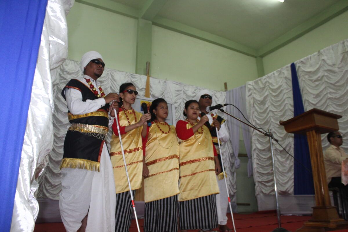 Photo: Members of BLT Team dress in traditional performed a song on White Cane